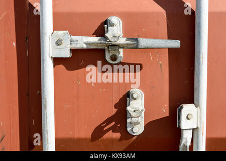 Closeup view of a worn intermodal container door locking system. Stock Photo