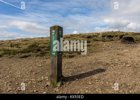 Pennine Way hiking signpost between Mill Hill and Kinder Scout showing the way to Snake Inn and Bleaklow, Peak District National Park, UK Stock Photo