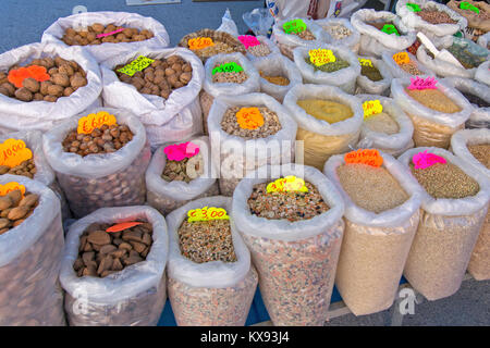 Beans and Nuts for sale on a market stall Stock Photo