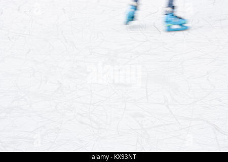 Arty blurry soft ice skating legs , winter recreation background Stock Photo