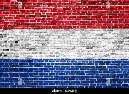 Flag of  Netherlands painted on brick wall, background texture Stock Photo