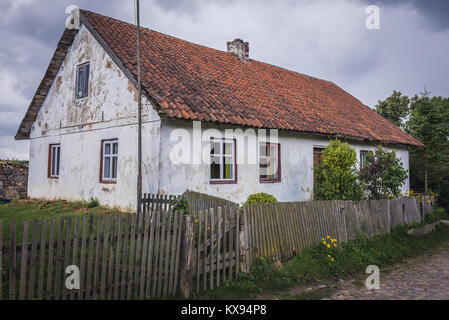 Old traditional cottage in a small Lipowo village, Gizycko county in Warmian-Masurian Voivodeship of Poland Stock Photo