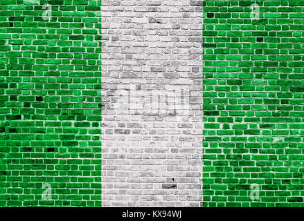 Flag of Nigeria painted on brick wall, background texture Stock Photo