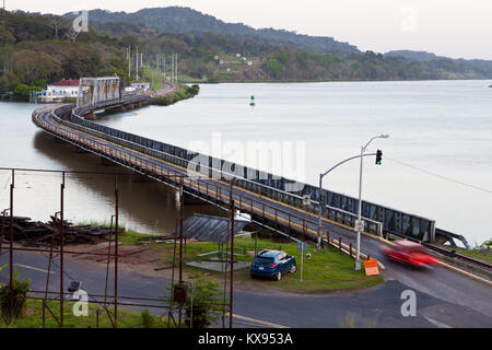 The car and railroad bridge over the outlet of Rio Chagres, Gamboa, Republic of Panama. The Panama Canal is to the right. Stock Photo