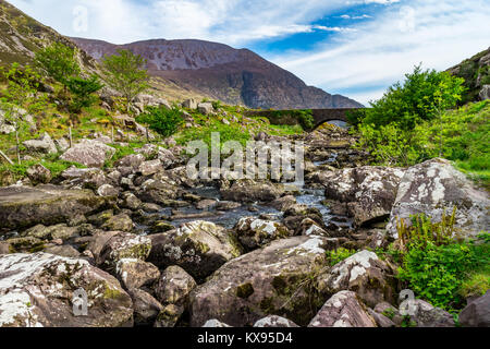 Gap of Dunloe, mountain pass, County Kerry, Ireland, Europe, scene with Wishing Bridge between Black Lake and Coosaun Lough Stock Photo