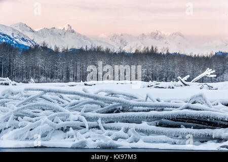 Chilkat River and Mountains in snow on a sunrise. Alaska.USA Stock Photo