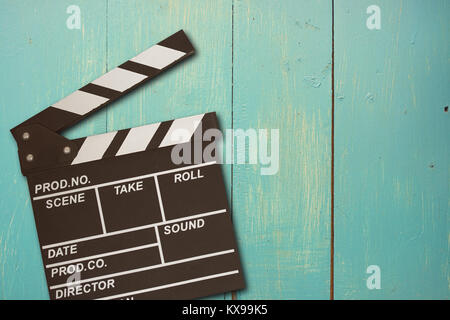 vintage photo of movie clapper on wood Stock Photo