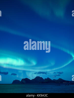 Aurora Borealis, Northern Lights over Vestagoy, Lofoten, Nordland, Norway.  Viewed from Sandnes, Flakstadoya. Stock Photo