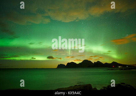 Aurora Borealis, Northern Lights over Vestagoy, Lofoten, Nordland, Norway.  Viewed from Sandnes, Flakstadoya. Stock Photo