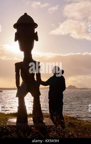 Sculpture, The Tourist, at Stamsund, Vestvagoy, Lofoten, Nordland, Norway.  The sculpture is made by Baktruppen and Trond Solberg Stock Photo