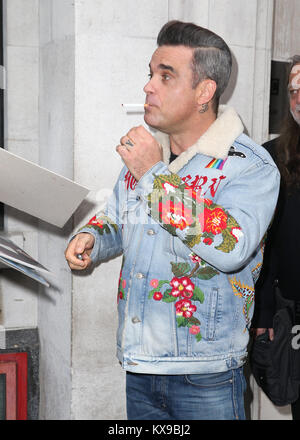 Robbie Williams pictured arriving at the Radio 2 studio  Featuring: Robbie Williams Where: London, United Kingdom When: 08 Dec 2017 Credit: Mario Mitsis/WENN.com Stock Photo