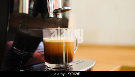 Coffee machine making coffee in morning with crema Stock Photo