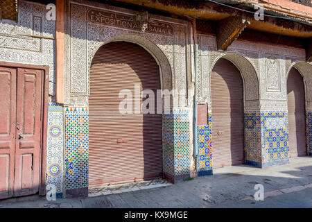 crafted Moroccan door with tiles and patterns, Marrakech, Morocco Stock Photo