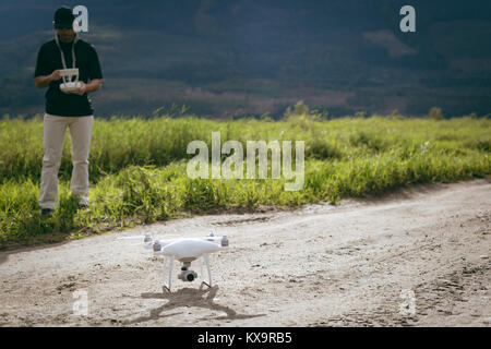 Remote control for the drone in the hands of man Stock Photo
