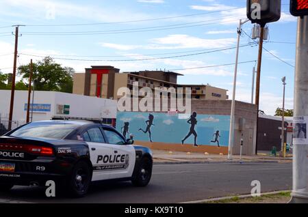an albuquerque police black and white dodge charger car patrols the city streets Stock Photo