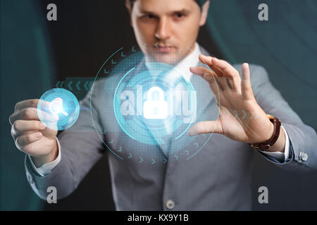 Cyber Security Data Protection Business Technology Privacy concept.Businessman pressing  button on virtual screens Stock Photo