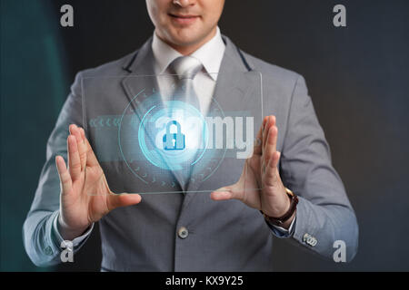 Cyber Security Data Protection Business Technology Privacy concept.Businessman pressing  button on virtual screens Stock Photo