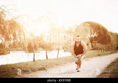 https://l450v.alamy.com/450v/kx9yw8/running-in-the-evening-sunlight-active-sport-concept-healthy-sportsman-kx9yw8.jpg