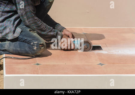 Drill work using tile cutting tool Stock Photo