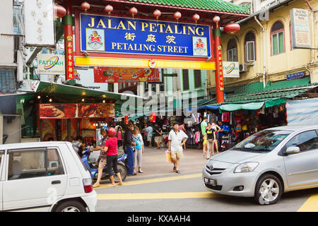 KUALA LUMPUR - DECEMBER 18: Petaling Street on December 18, 2012 in Kuala Lumpur, Malaysia. This street is a long market which specializes in counterf Stock Photo