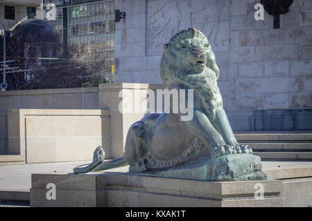 Wellington, New Zealand - 28 September, 2015: Bronze Lion at the base of the Wellington Cenotaph located  on the intersection of Lambton Quay and Bowe Stock Photo