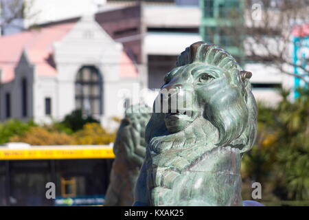 Wellington, New Zealand - 28 September, 2015: Bronze Lion at the base of the Wellington Cenotaph located  on the intersection of Lambton Quay and Bowe Stock Photo