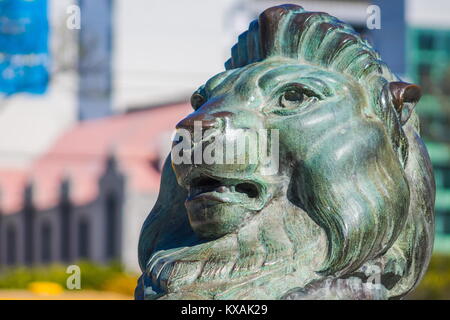 Wellington, New Zealand - 28 September, 2015: Bronze Lion at the base of the Wellington Cenotaph located  on the intersection of Lambton Quay and Bowe Stock Photo