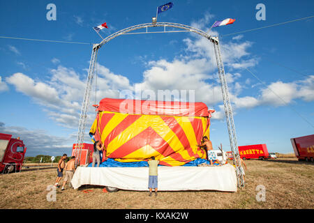Members of Zavatta family removing big top of circus tent, Zavatta Circus, Kerroch, Morbihan, Brittany, France Stock Photo