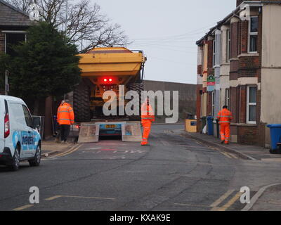 Sheerness, Kent, UK. 8th Jan, 2018. The unusual sight of a giant dumper truck being unloaded, briefly blocking Marine Parade in Sheerness. The Bell articulated dump truck is being used for sea defense work being undertaken by the Environment Agency to move large volumes of shingle. Credit: James Bell/Alamy Live News Stock Photo