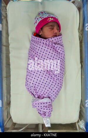 KUALA LUMPUR, MALAYSIA - JANUARY 01: A baby girl born in January 2018 is seen seep inside the babycourt at Hospital in Kuala Lumpur on January 1, 2018. Malaysian children born from January 1, 2018 to December 31, 2022 as a part of the Transformasi Nasional 2050 (TN50) generation is a new approach by the government to create a future savings account was introduced by Malaysia goverment for the first time in parliament (Malaysia Budget 2018) through The Amanah Dana Anak Malaysia 2050 (ADAM50) program. Credit: Samsul Said/AFLO/Alamy Live News Stock Photo