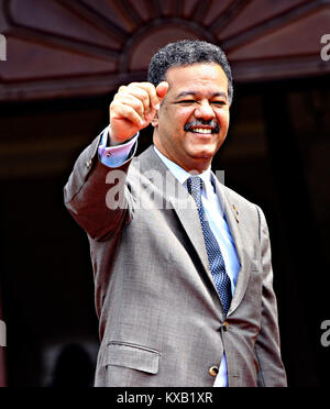 April 19, 2009 - Port Of Spain, Trinidad & Tobago - April 19, 2009. Leonel Fernandez, former president of Dominican Republic, greets when he looks for accommodation for the official photo of the V Summit of the Americas, held in Port of Spain, Trinidad & Tobago. From April 17 to 19, 2009. Photo: Juan Carlos Hernandez (Credit Image: © Juan Carlos Hernandez via ZUMA Wire) Stock Photo