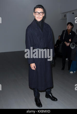 Hu Bing on the front row during the D.Gnak Autumn/ Winter 2018 London Fashion Week show at BFC Show Space, London Stock Photo