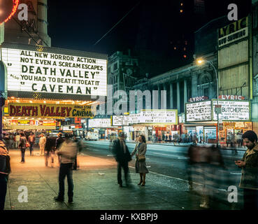 New York 1980s, movie theatres, people, 42nd street, night, Manhattan, New York City, NY, NYC, USA, Stock Photo