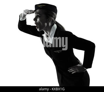 one caucasian Stewardess cabin crew  woman  looking away surprised  isolated on white background in  silhouette Stock Photo
