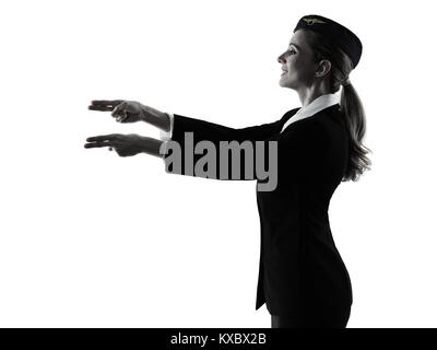 one caucasian Stewardess cabin crew  woman pointing showing isolated on white background in  silhouette Stock Photo