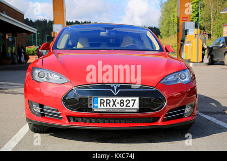 SALO, FINLAND - SEPTEMBER 6, 2014: Tesla Model S electric car parked. In 2013, Tesla delivered 22,477 vehicles to customers worldwide. Stock Photo