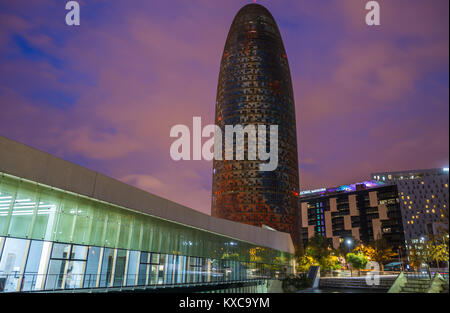 Night view of Torre Agbar skyscraper designed by French architect Jean Nouvel, Barcelona, Catalonia, Spain. Stock Photo