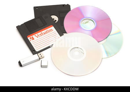DIKANKA, UKRAINE - NOVEMBER 26, 2015: Set of different computer storage devices for data and information including a CD-DVD, floppy disc, USB key Stock Photo