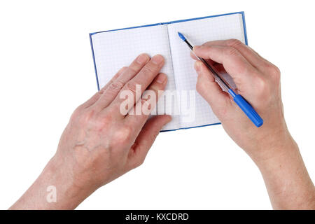An elderly man writes addresses of friends in a paper notebook. Isolated on white studio top view memory concept Stock Photo