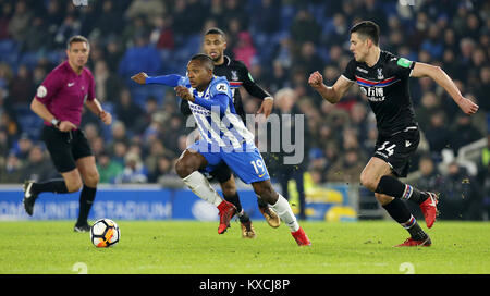 Brighton & Hove Albion's Jose Izquierdo breaks through Crystal Palace's Martin Kelly (right) and Jairo Riedewald during the Emirates FA Cup, Third Round match at the AMEX Stadium, Brighton.