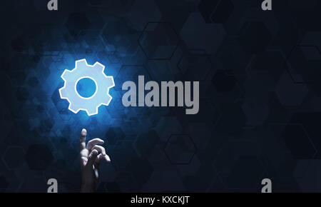 Technology conceptual image with gear digital symbol on dark background Stock Photo