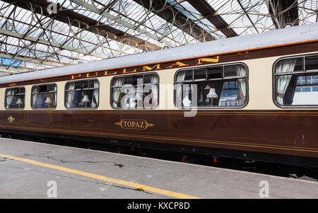 A preserved Pullman carriage is pictured in Carlisle Citadel station in Cumbria.  Pullman was a luxury railway service that operated in Great Britain. Stock Photo