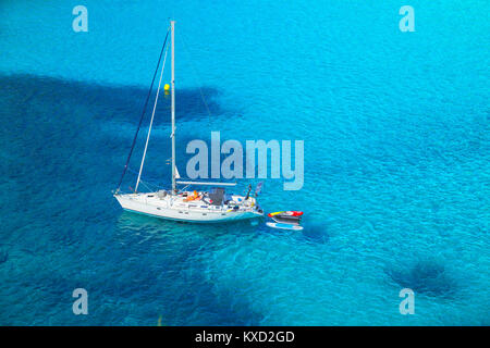 View of Cala Macarella and sailboat, Menorca, Balearic Islands, Spain Stock Photo