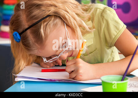 Small students children painting in art school class. Stock Photo