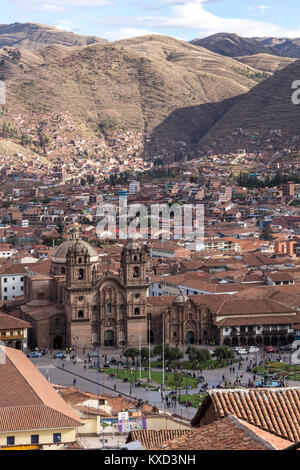 High angle view of cathedral amidst houses against mountains in city Stock Photo