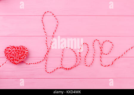 Word love made from string. Stock Photo
