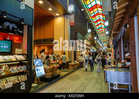 KYOTO, JAPAN - OCTOBER 23: Nishiki Market in Kyoto, Japan on October 23, 2014. A narrow, five block long shopping street lined by more than one hundre Stock Photo