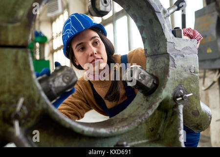 Female Mechanic at Factory Stock Photo