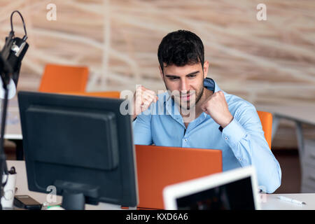 Freelance programmer working in startup office Stock Photo