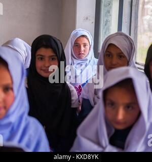 SKARDU, PAKISTAN - APRIL 17: An unidentified Children in village in the south of Skardu are learning in classroom of the village school April 17, 2015 Stock Photo